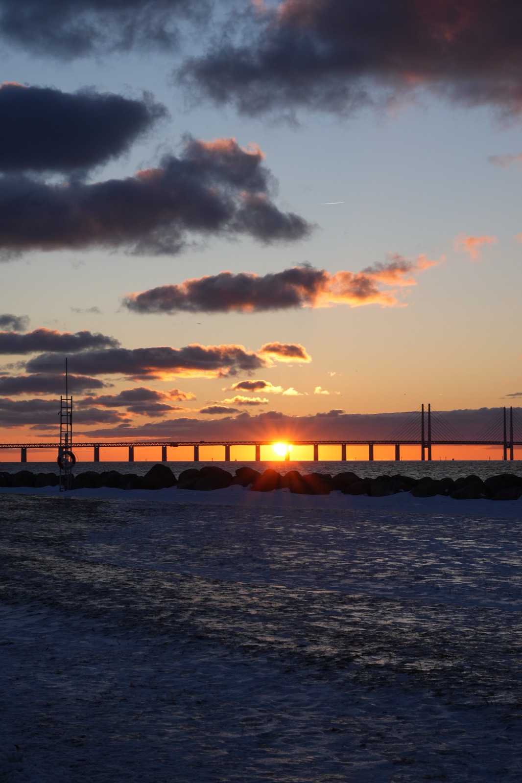 The Öresund Bridge at sunset, seen from Malmö